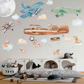 A playful scene with vintage airplanes, cute dogs, clouds, stars, and luggage, perfect for a child's room.